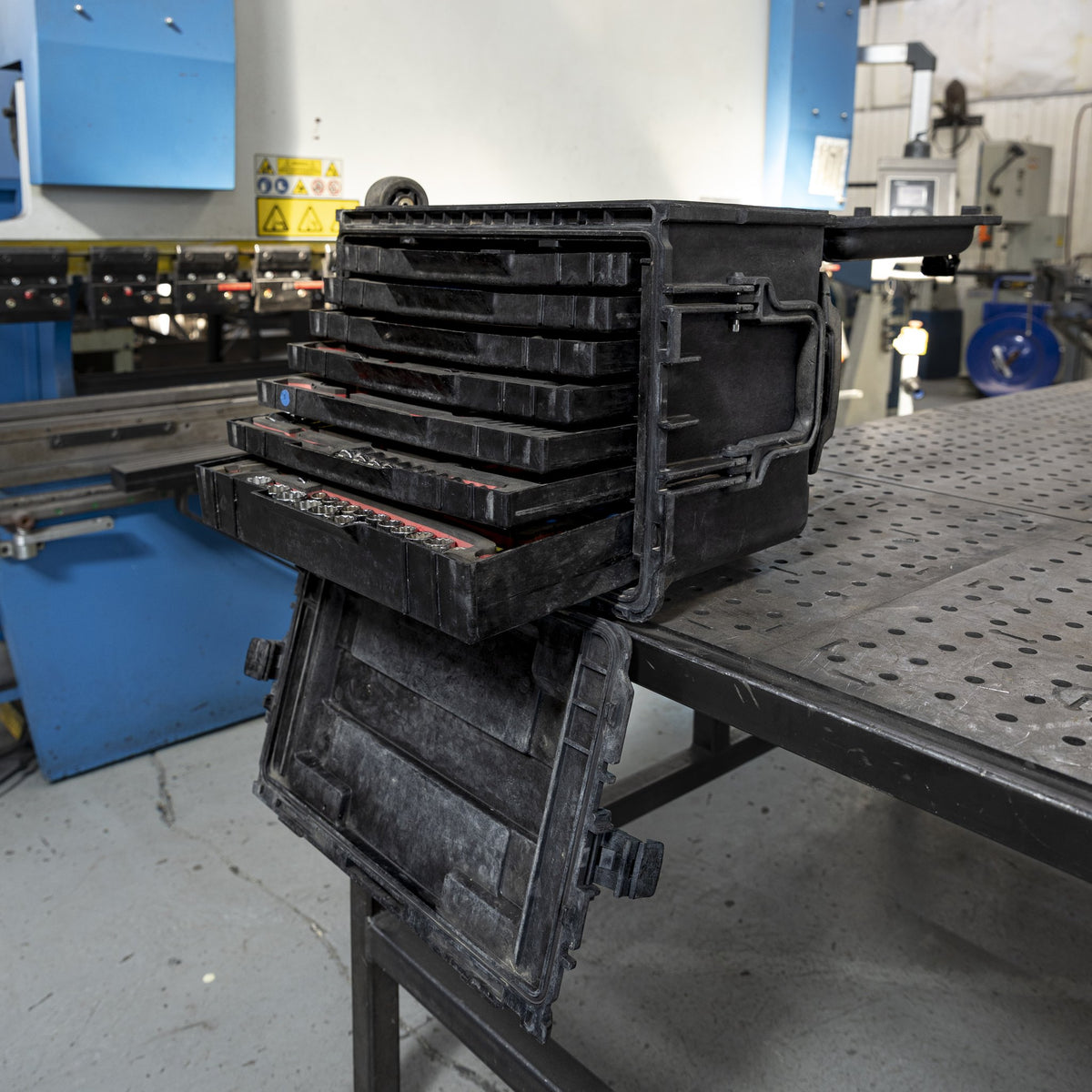 Military tool kit drawers open in the shop