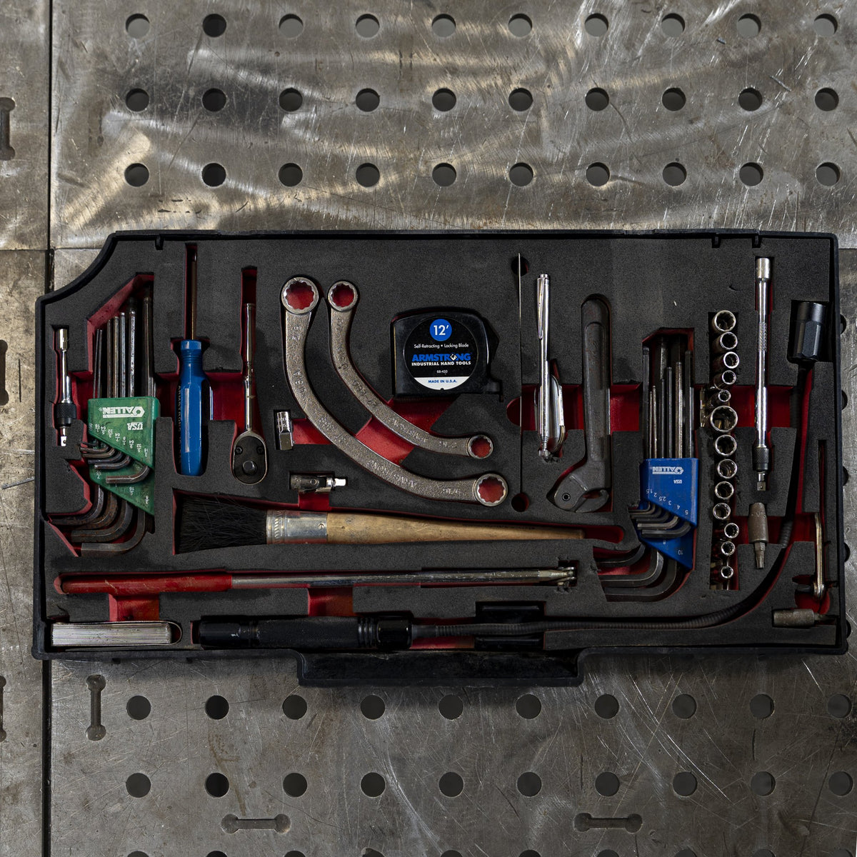 Tool tray with wrenches, hex keys and pliers